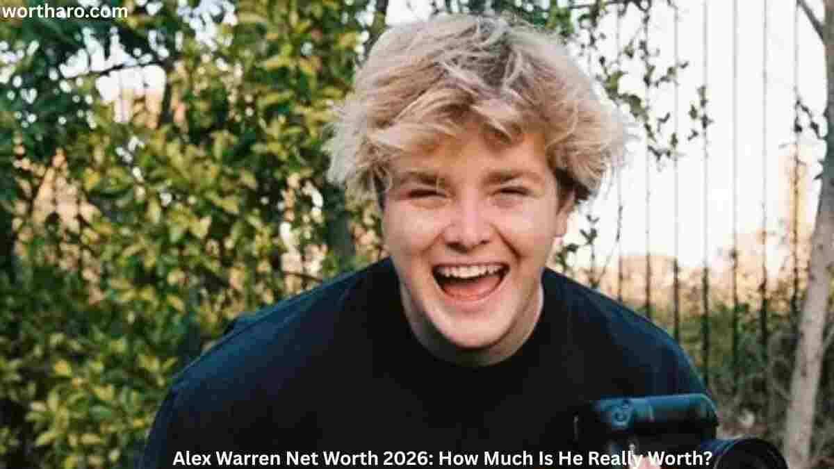 Alex Warren smiling outdoors while discussing his net worth, income, and career in 2026.