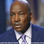 Clifton Powell Net Worth – Clifton Powell during a television interview discussing his acting career.