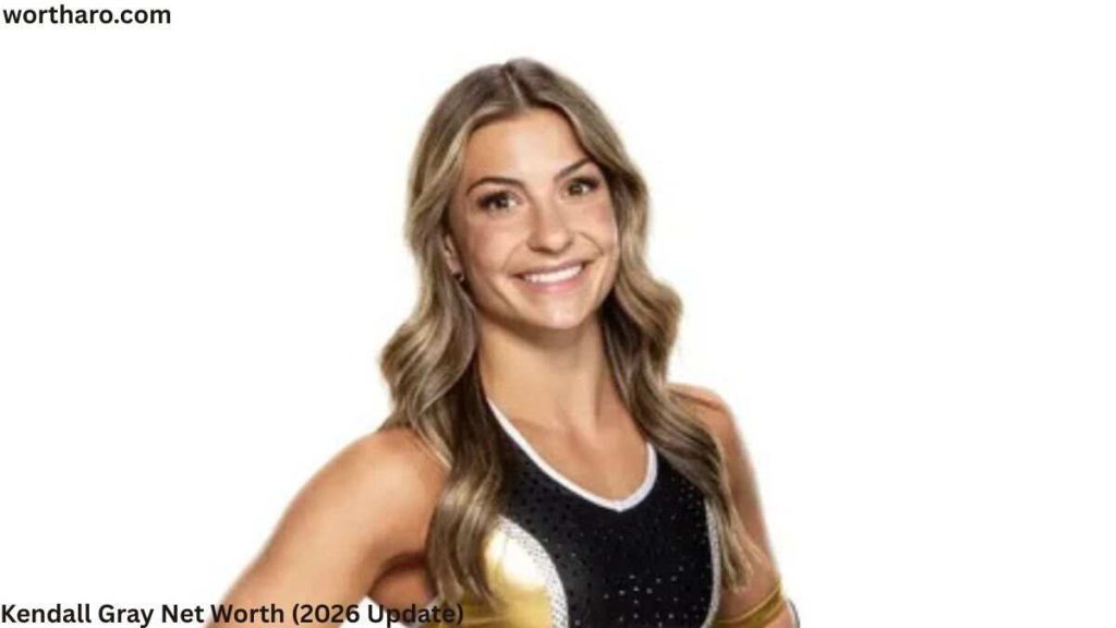Kendall Gray Net Worth – Kendall Gray posing in a cheerleading uniform.