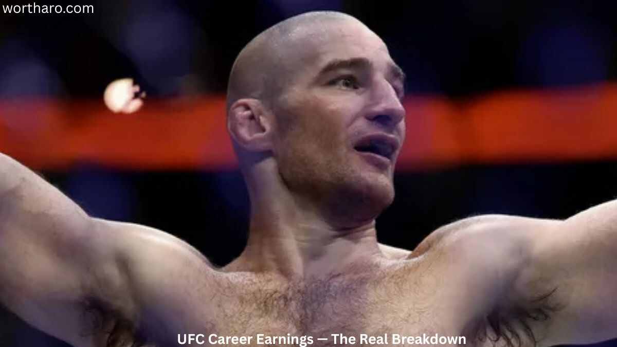 Sean O'Malley Net Worth – Sean O'Malley celebrating after a UFC victory inside the Octagon.