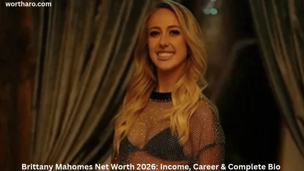 Brittany Mahomes Net Worth 2026 – Brittany Mahomes smiling at an event in a stylish outfit.