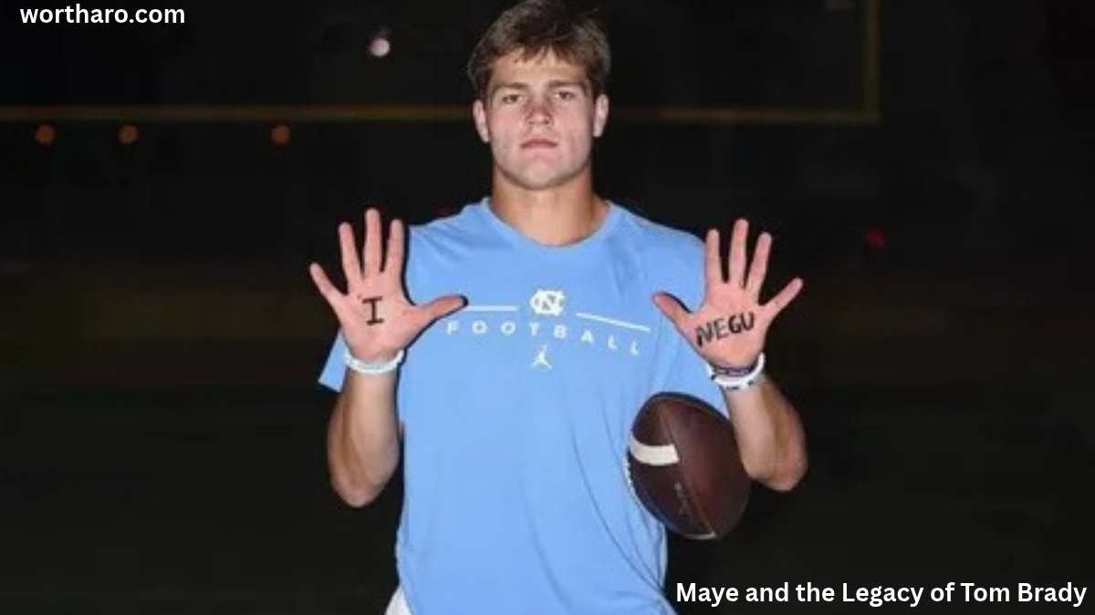 Drake Maye holding a football during his UNC football days – Drake Maye Net Worth