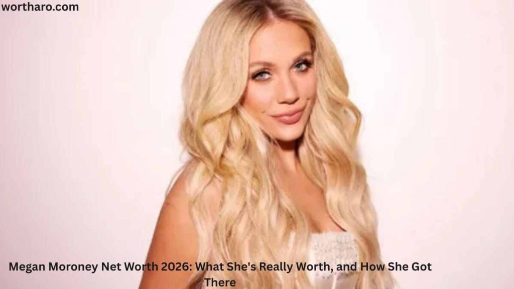 Megan Moroney Net Worth – Country music star Megan Moroney posing in a white outfit during a promotional photoshoot.