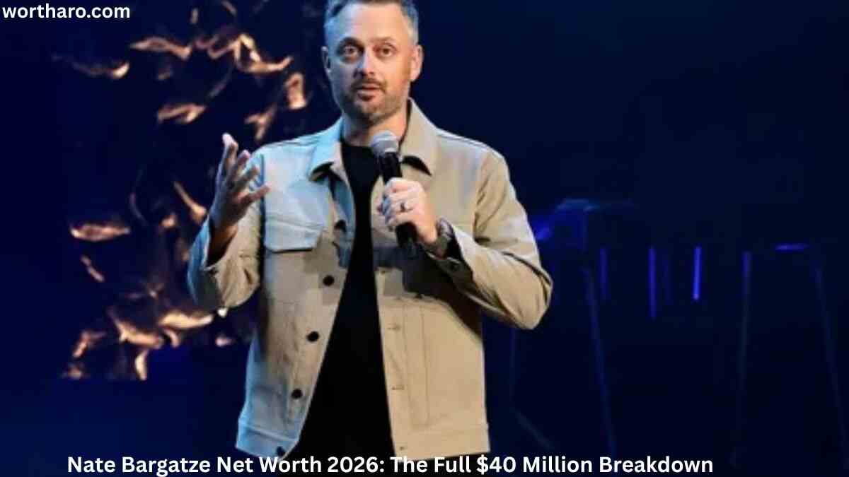Nate Bargatze performing stand-up comedy on stage during a live show while discussing his successful career and Nate Bargatze Net Worth.