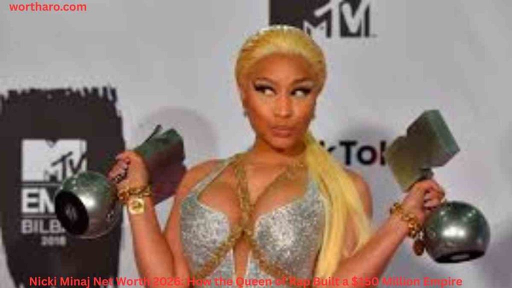 Nicki Minaj Net Worth 2026 – Nicki Minaj posing at the MTV Europe Music Awards in a glamorous silver outfit.