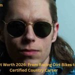 Redferrin wearing sunglasses during a portrait while highlighting his country music career and Redferrin Net Worth