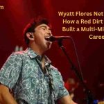Wyatt Flores performing on stage while singing into a microphone – Wyatt Flores Net Worth
